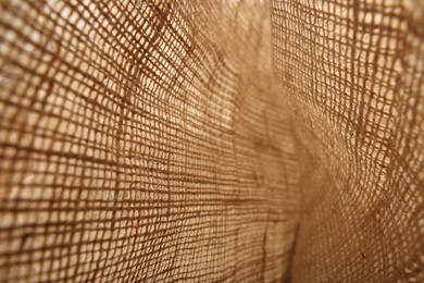 Texture of natural burlap fabric as background, closeup