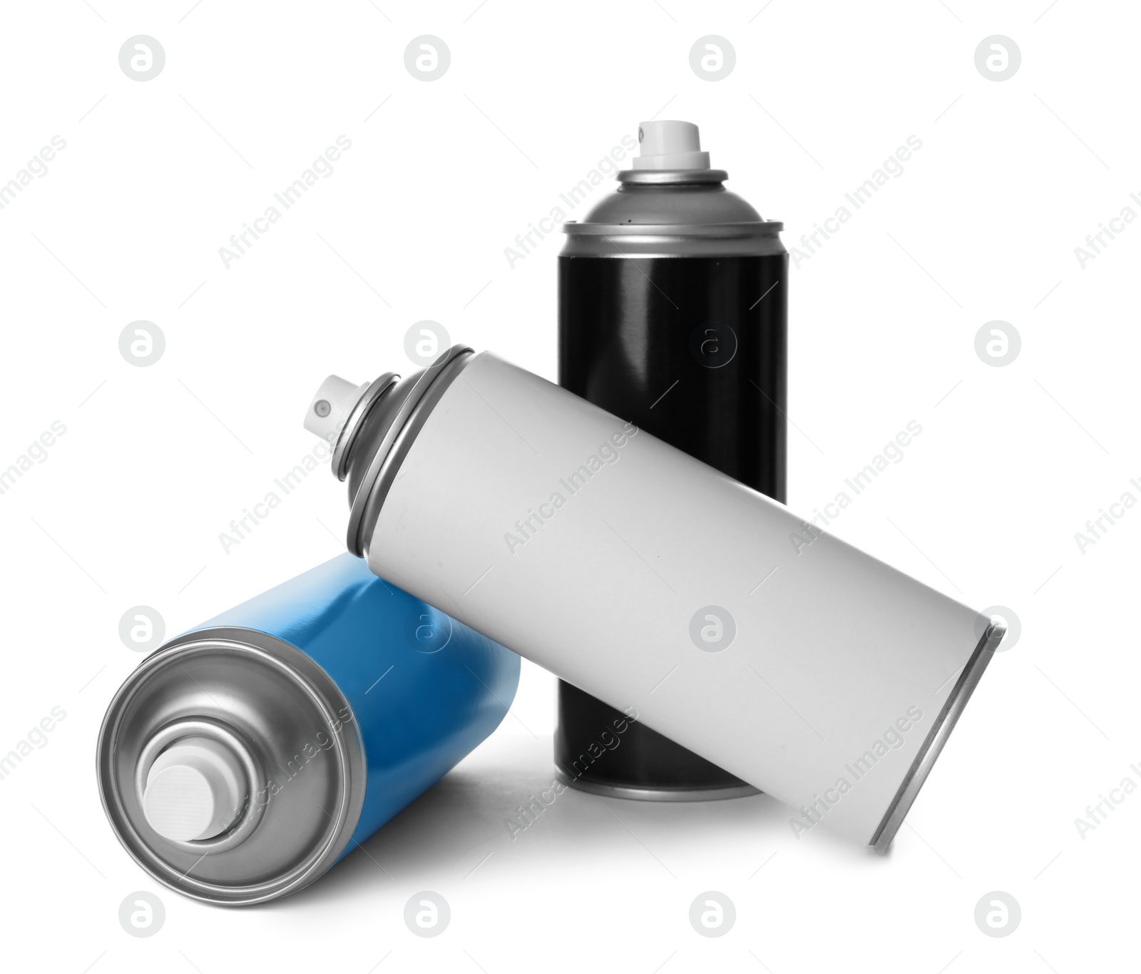 Photo of Cans of different spray paints on white background