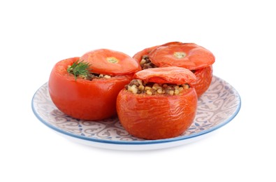 Photo of Plate of delicious stuffed tomatoes isolated on white