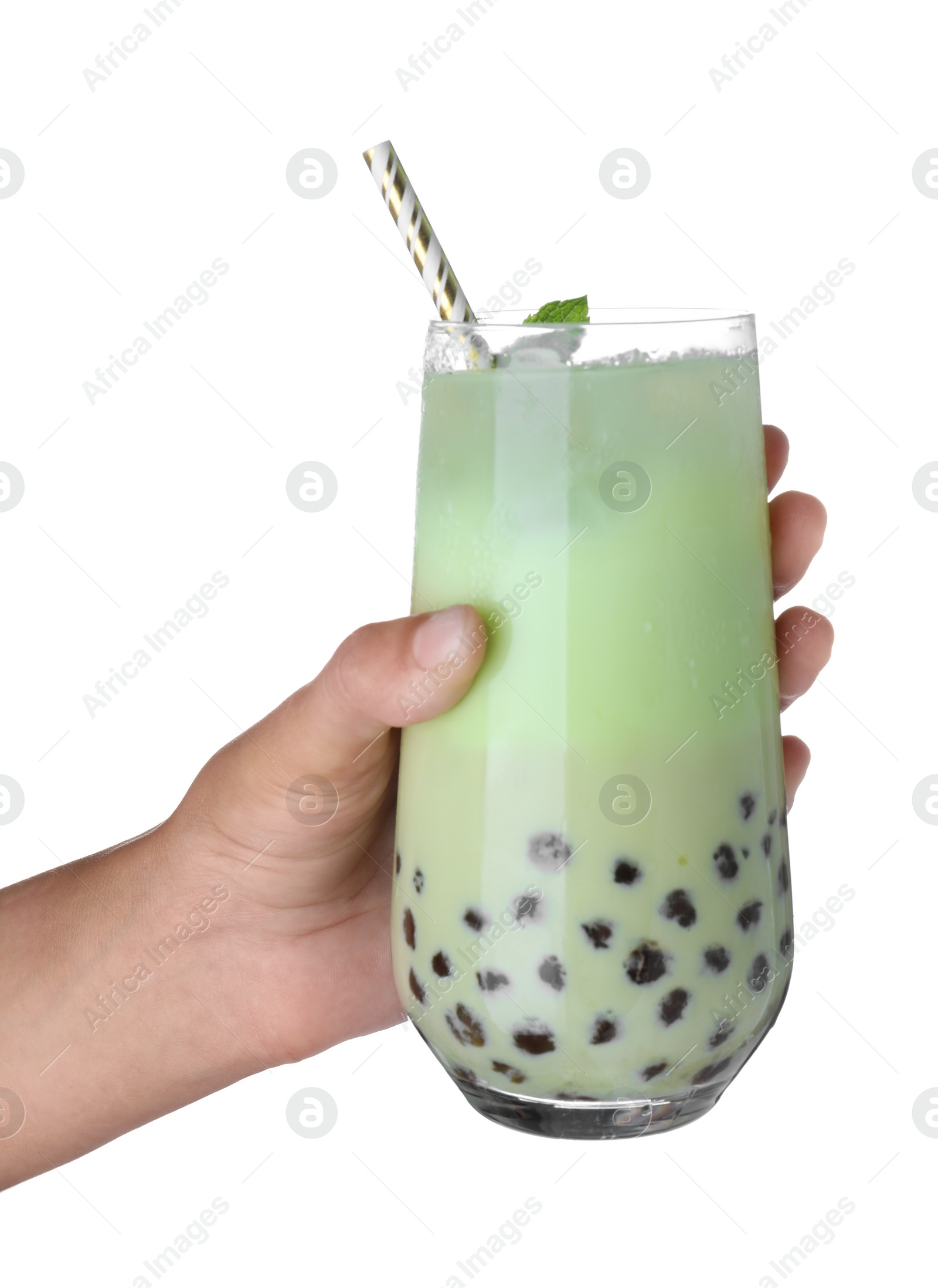 Photo of Woman holding tasty milk bubble tea with mint on white background, closeup