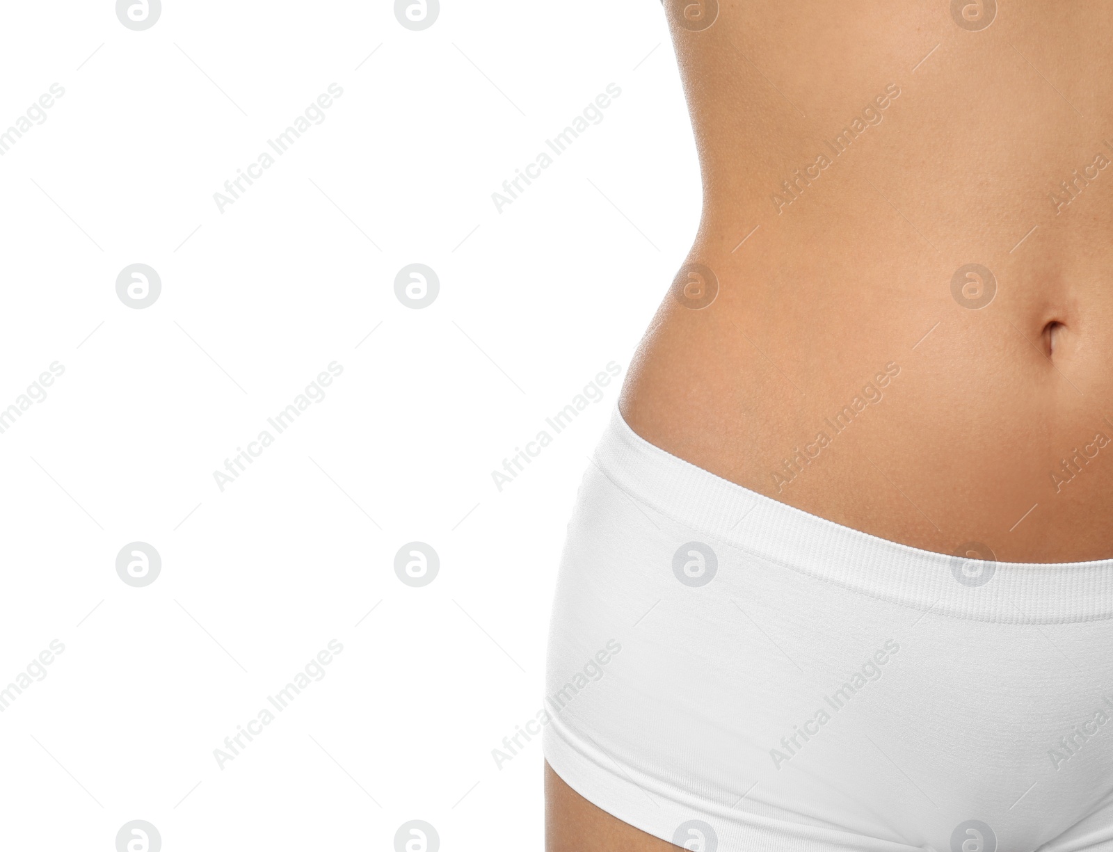 Photo of Young woman with slim body isolated on white, closeup. Plastic surgery concept