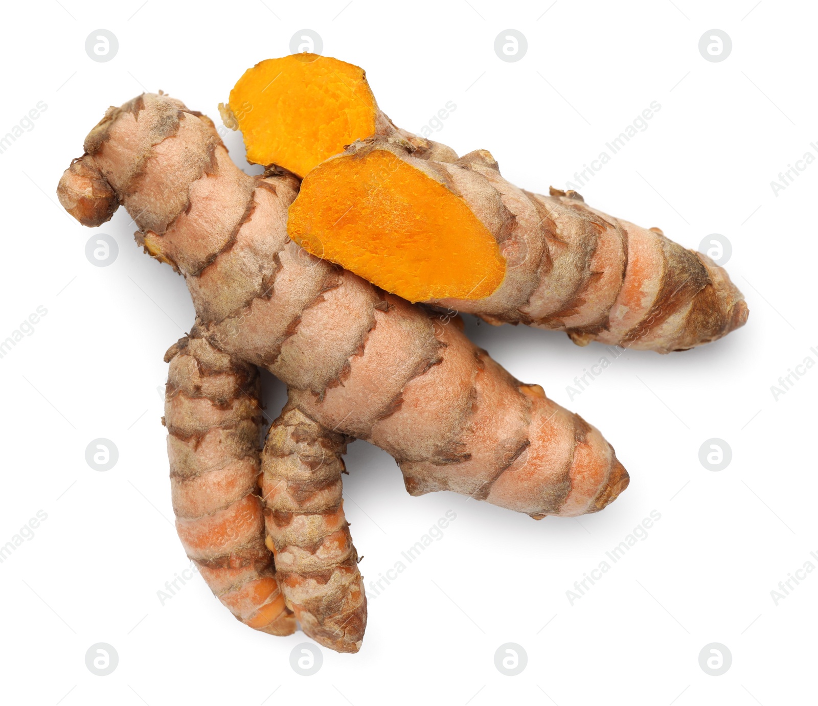 Photo of Fresh turmeric roots isolated on white, top view