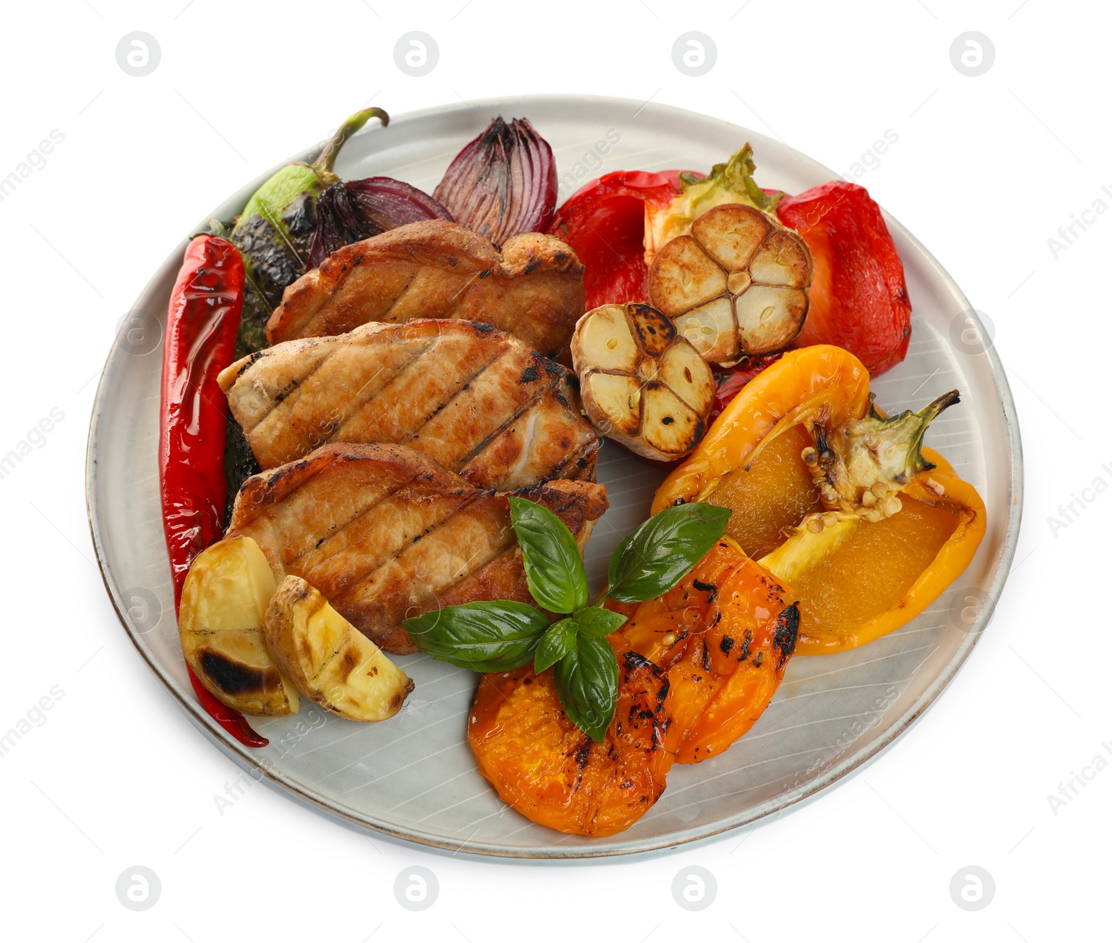 Photo of Plate with tasty grilled vegetables, meat and basil isolated on white, above view