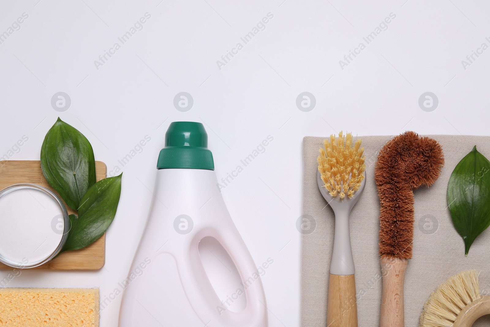 Photo of Flat lay composition with different cleaning supplies on white background