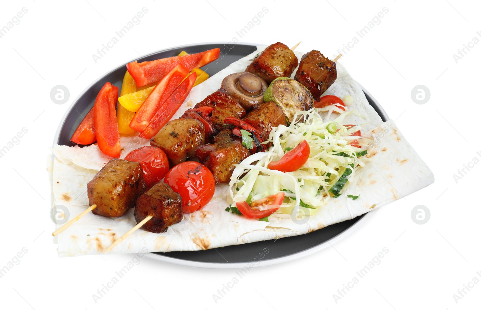 Photo of Delicious shish kebabs with vegetables isolated on white