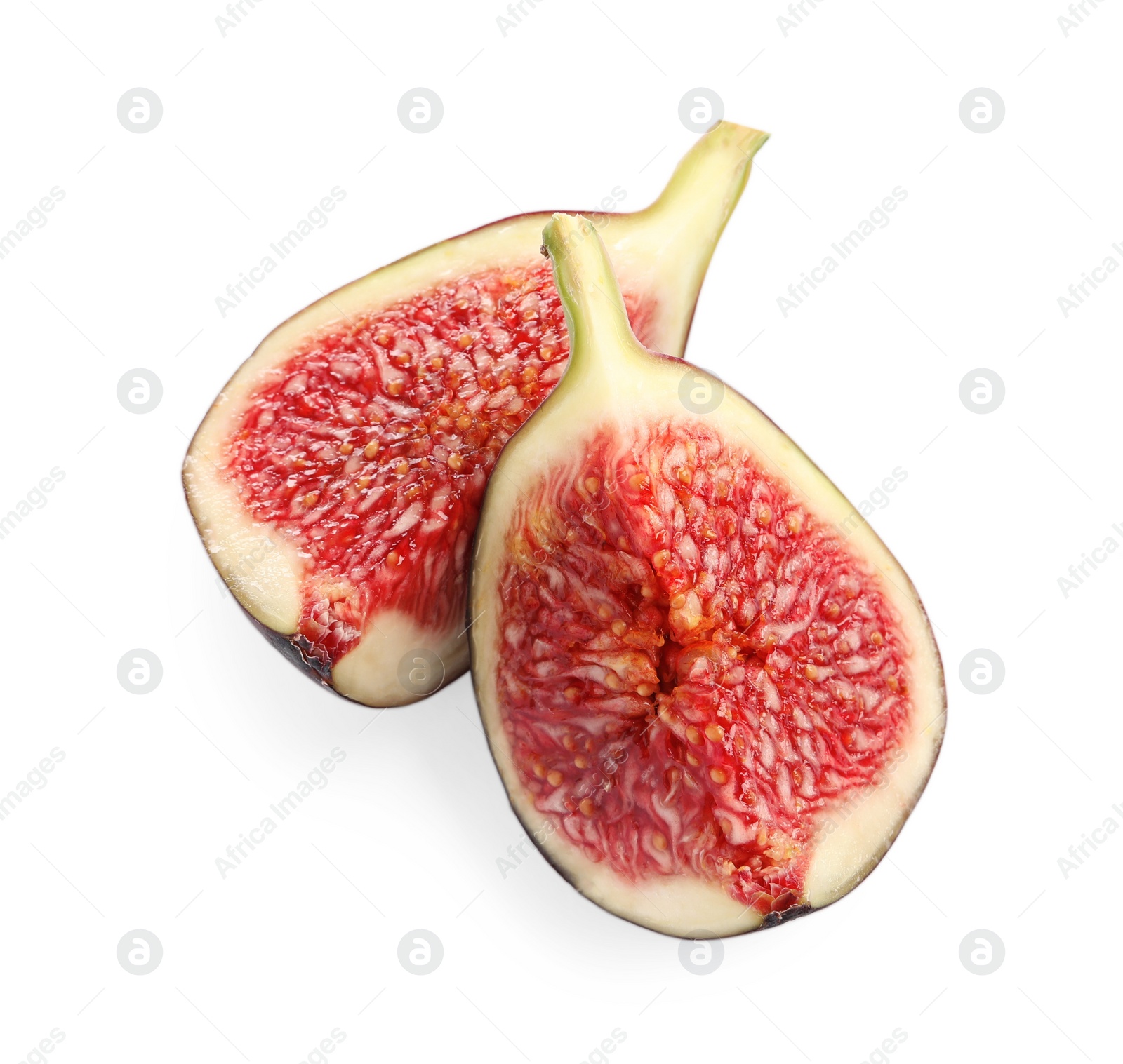 Photo of Halves of fresh fig isolated on white, top view