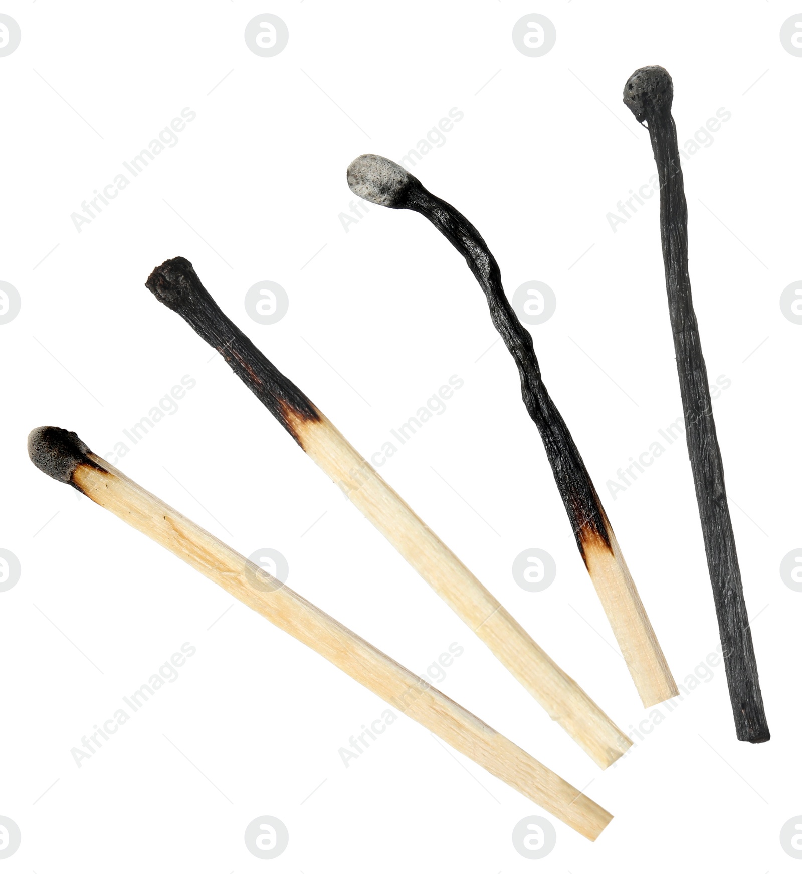 Image of Set with burnt matches on white background