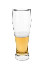 Half full glass of beer isolated on white