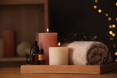 Beautiful composition with different spa products on wooden table indoors