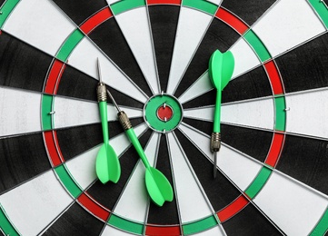 Photo of Dart board with color arrows, top view