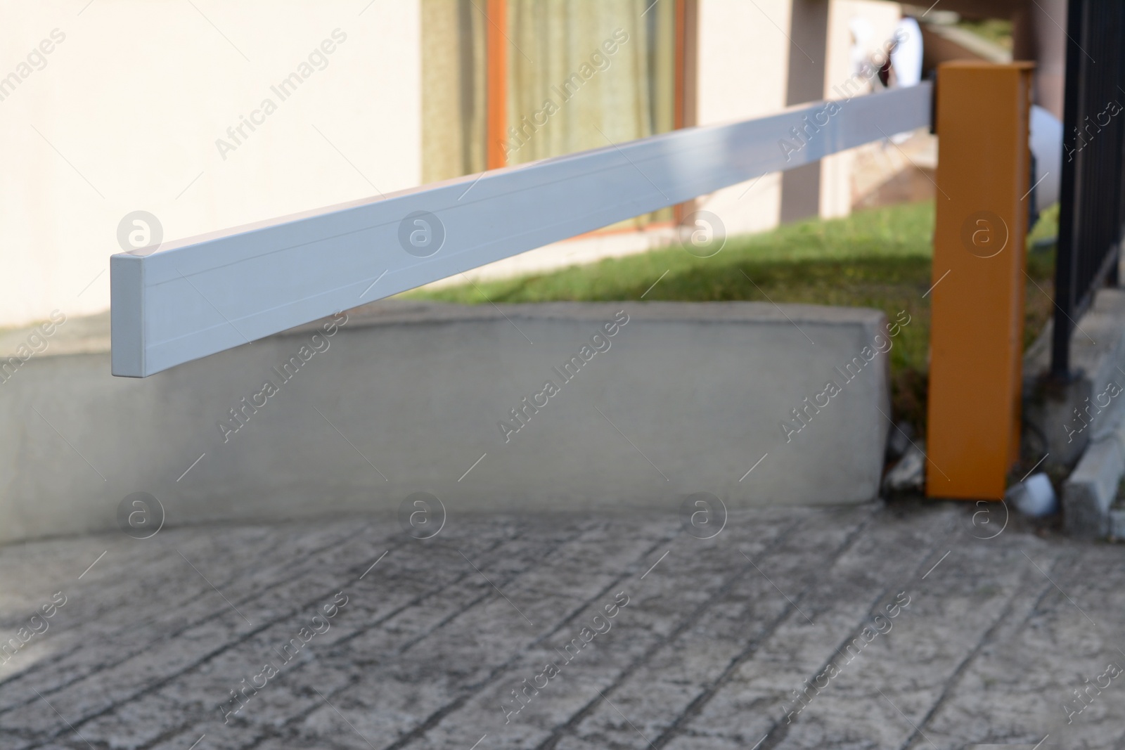 Photo of Closed boom barrier on autumn day outdoors