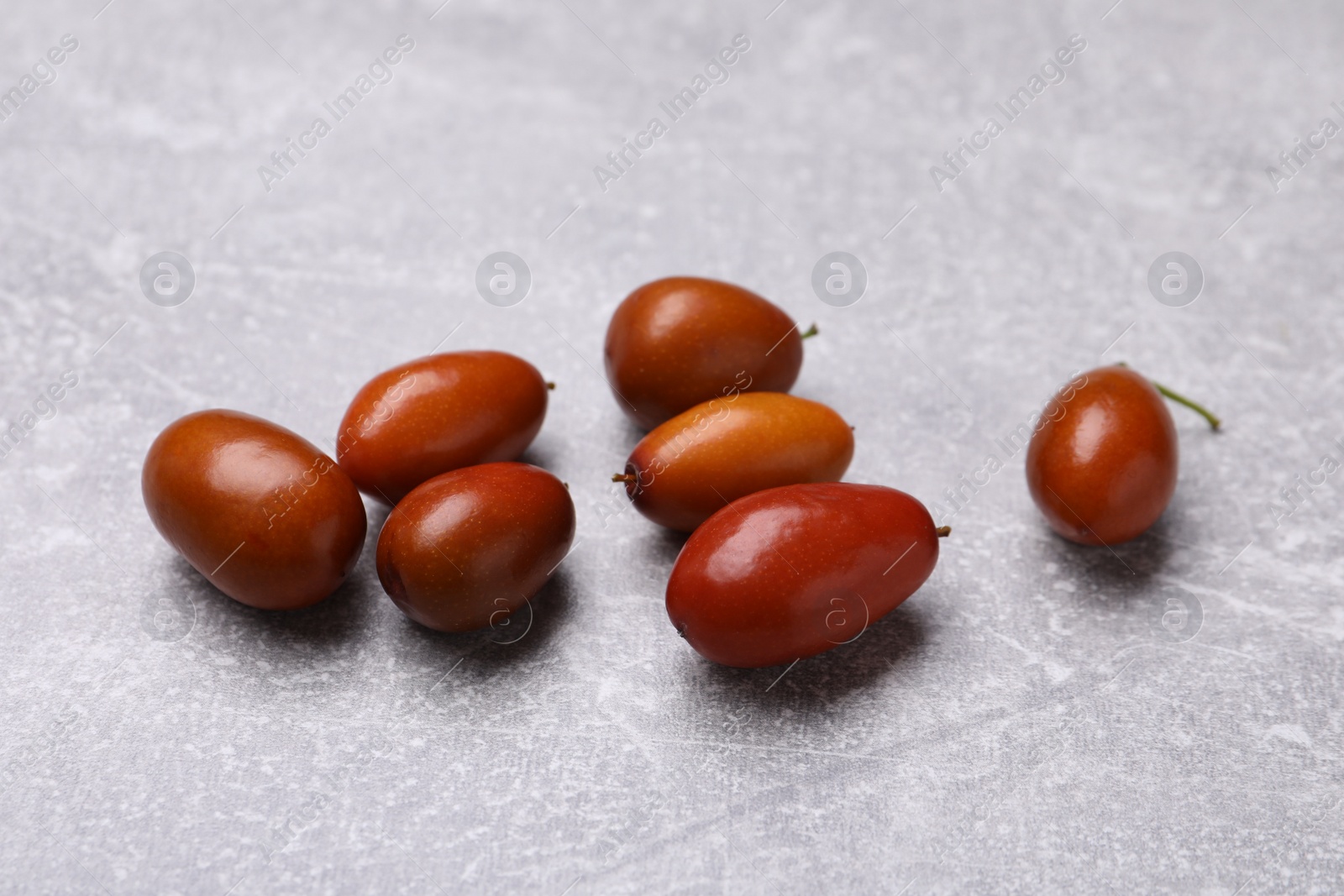 Photo of Fresh Ziziphus jujuba fruits on light table