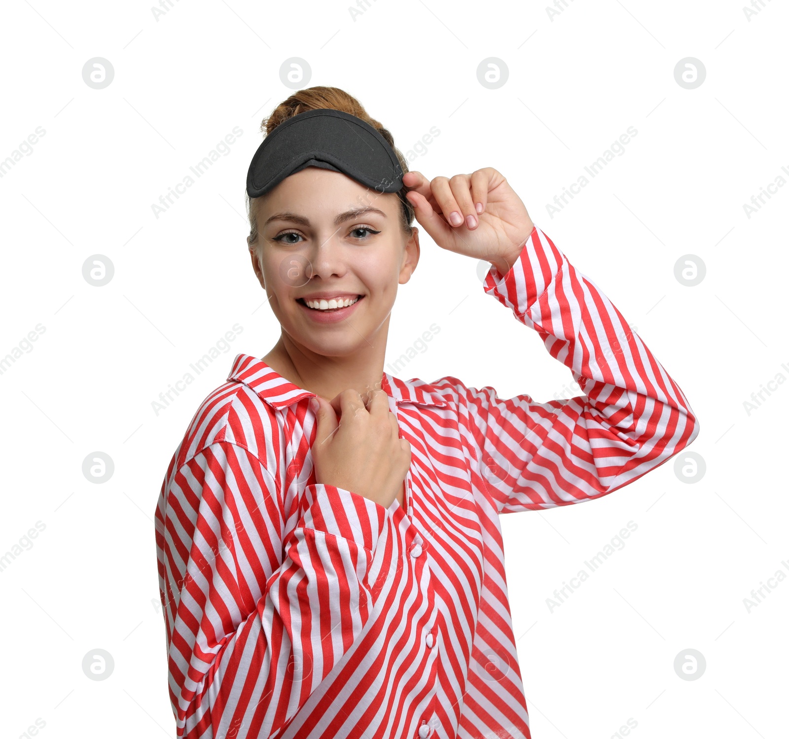 Photo of Beautiful woman wearing pajamas and sleeping mask on white background. Bedtime