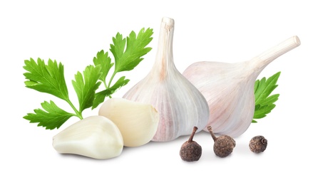 Image of Fresh garlic with parsley and allspice on white background