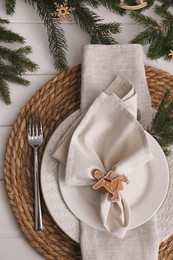 Photo of Beautiful festive place setting with stylish decor for Christmas dinner on white wooden table, flat lay