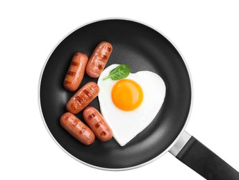 Romantic breakfast with fried sausages and heart shaped egg isolated on white, top view. Valentine's day celebration