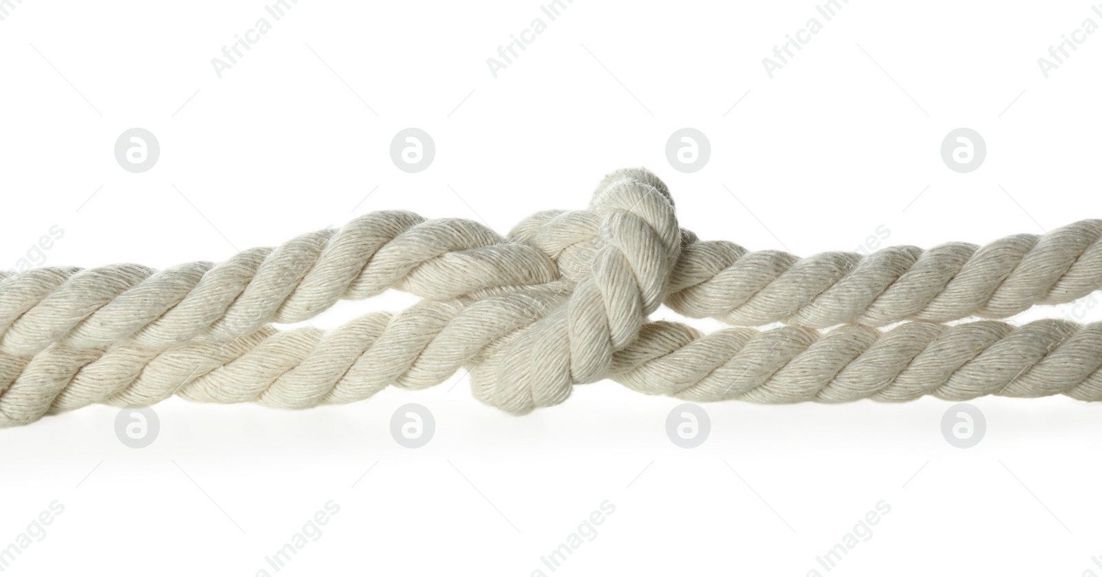 Photo of Cotton rope with knot on white background