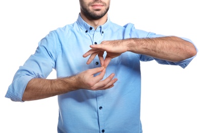 Photo of Man showing word INTERPRETER in sign language on white background, closeup