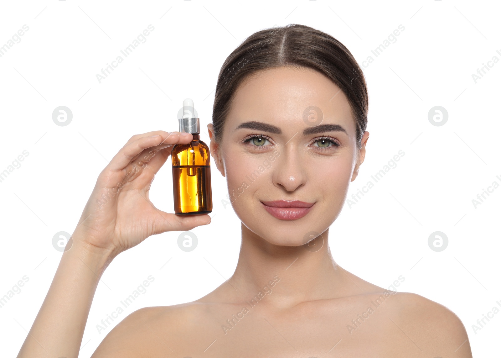 Photo of Young woman with bottle of essential oil on white background