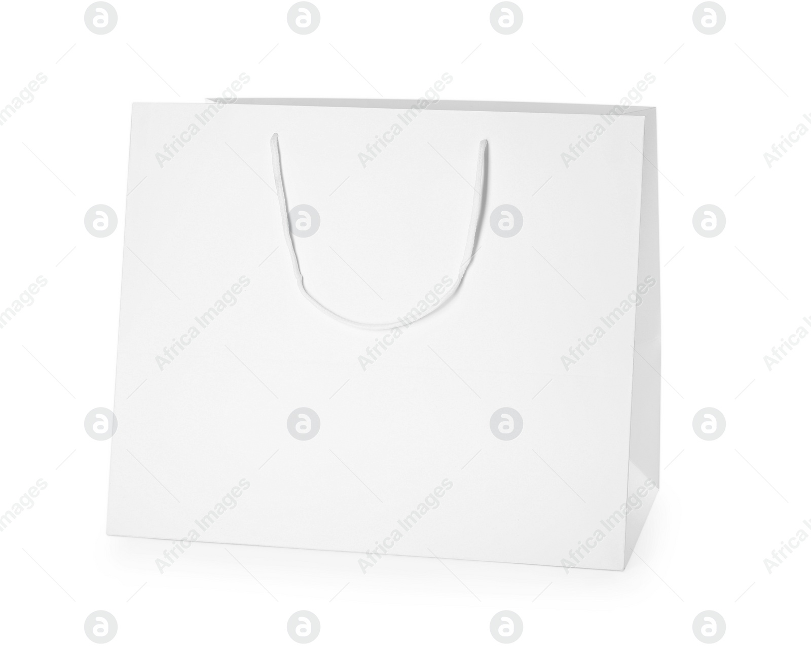 Photo of One paper shopping bag isolated on white