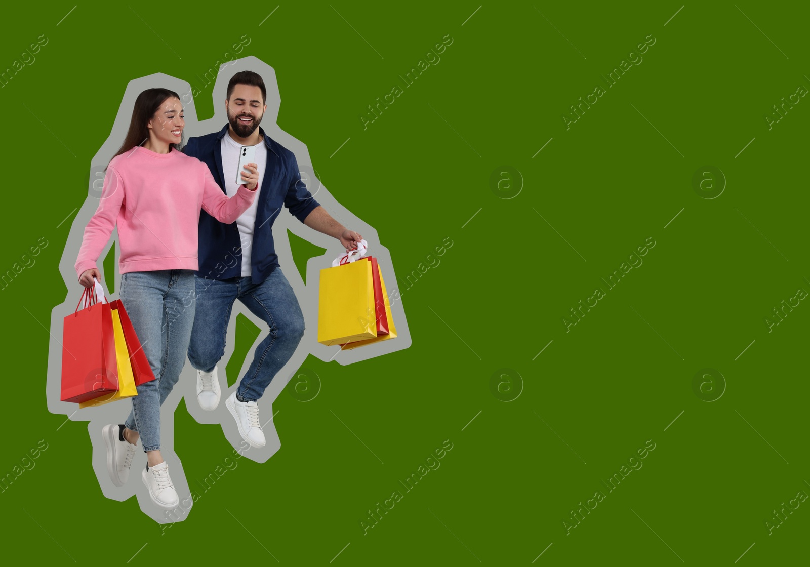 Image of Happy couple with shopping bags looking at smartphone and jumping on green background, space for text