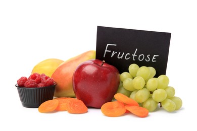 Photo of Card with word Fructose, delicious ripe fruits, raspberries and dried apricots isolated on white