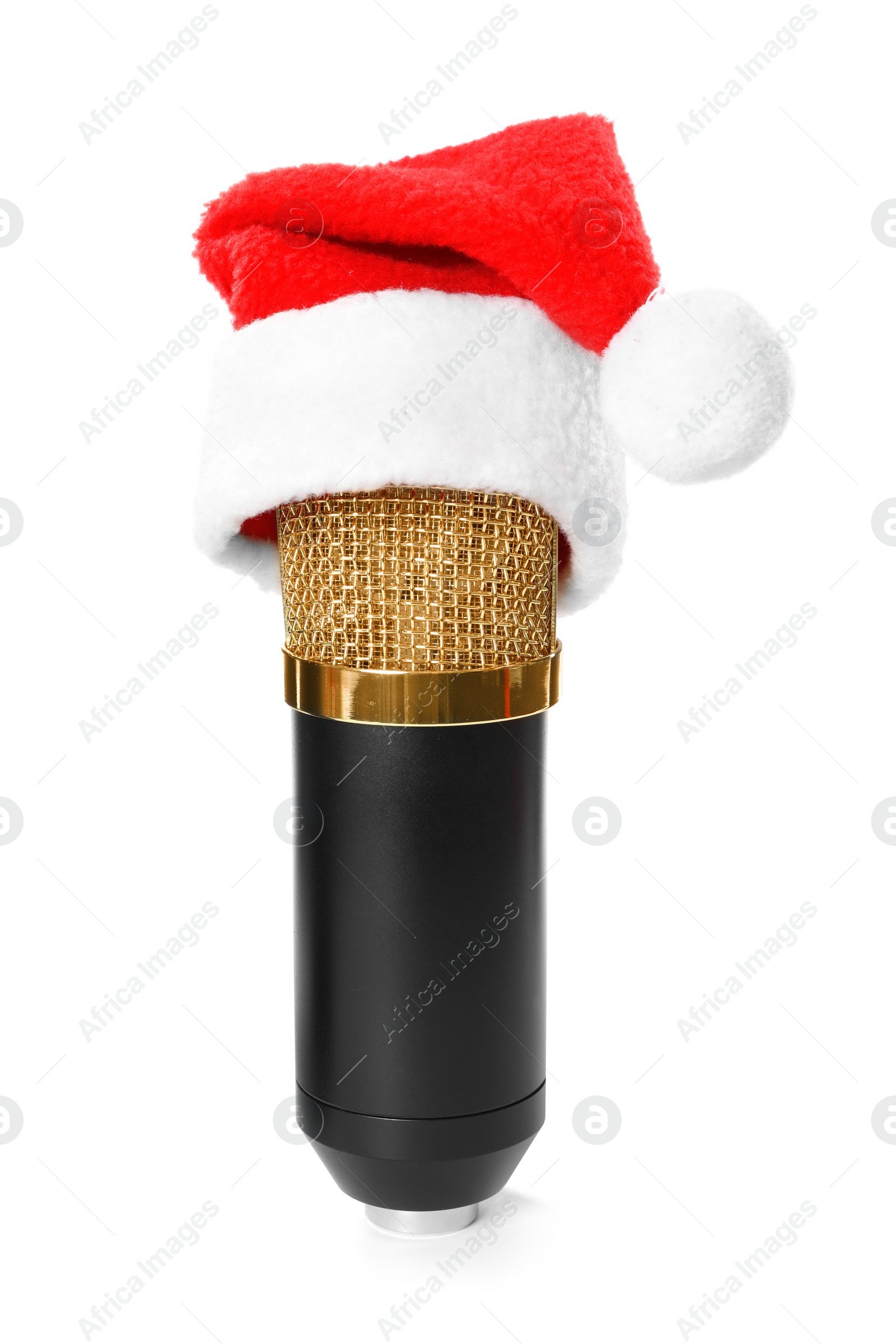 Photo of Microphone with Santa hat isolated on white. Christmas music