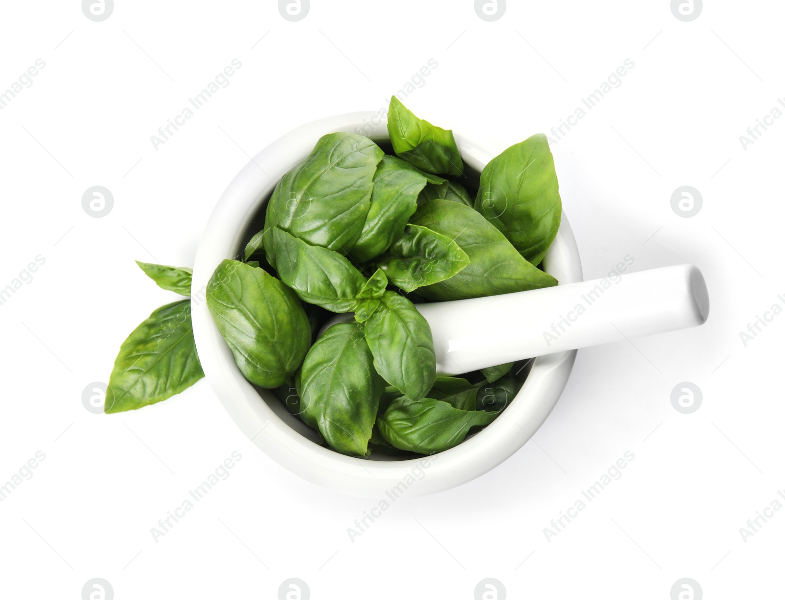 Photo of Mortar with fresh green basil leaves on white background, top view