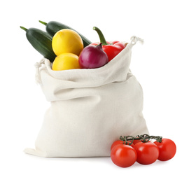 Photo of Cotton eco bag with vegetables isolated on white