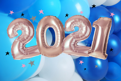 Silver foil 2021 balloons on color background