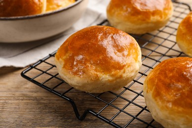 Tasty scones prepared on soda water on wooden table