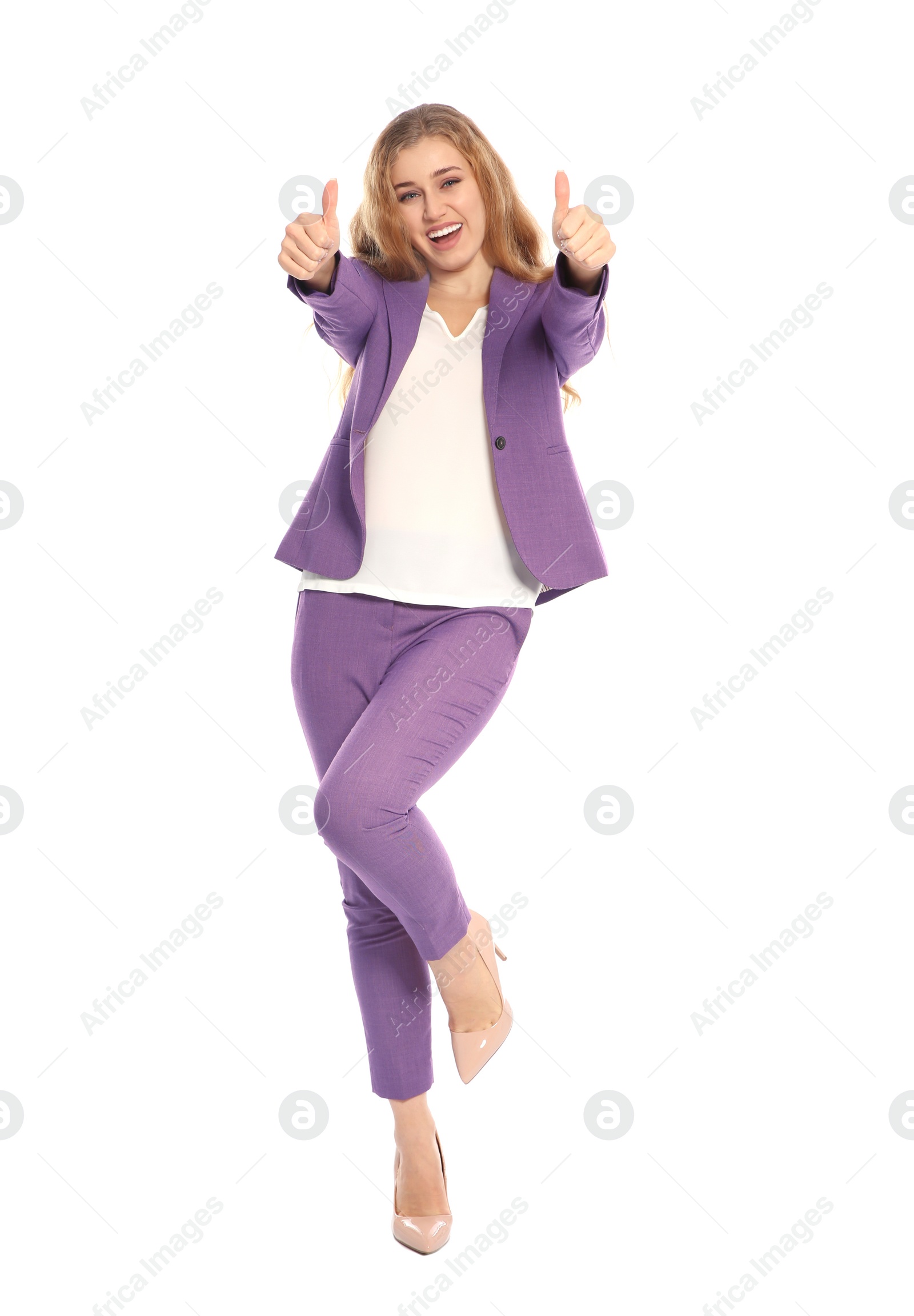 Photo of Happy young businesswoman showing thumbs up on white background. celebrating victory