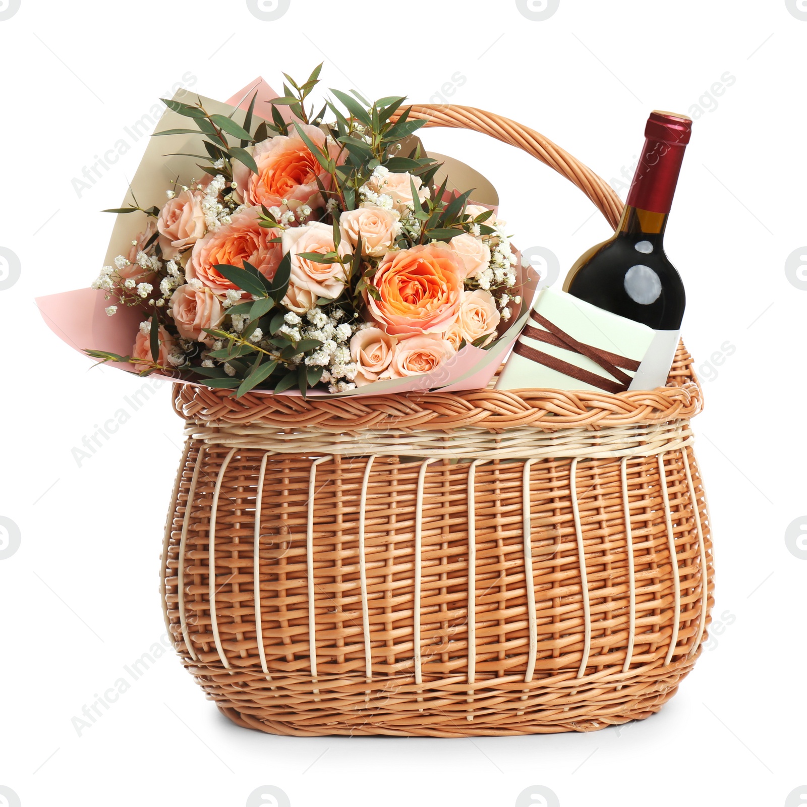 Photo of Wicker basket with different gifts on white background