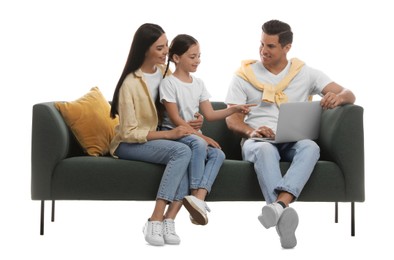 Happy family resting on comfortable green sofa against white background