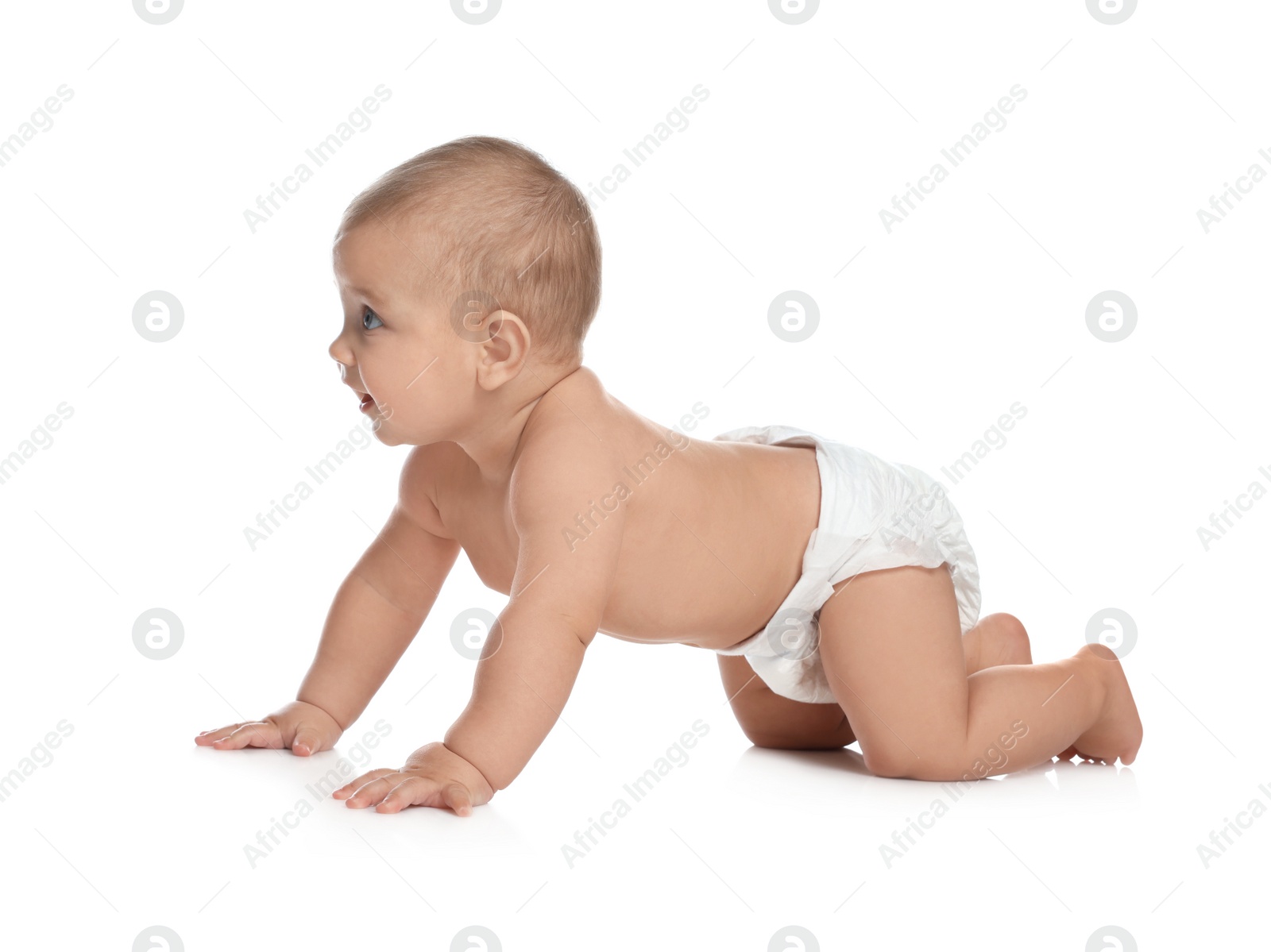 Photo of Cute little baby in diaper crawling on white background