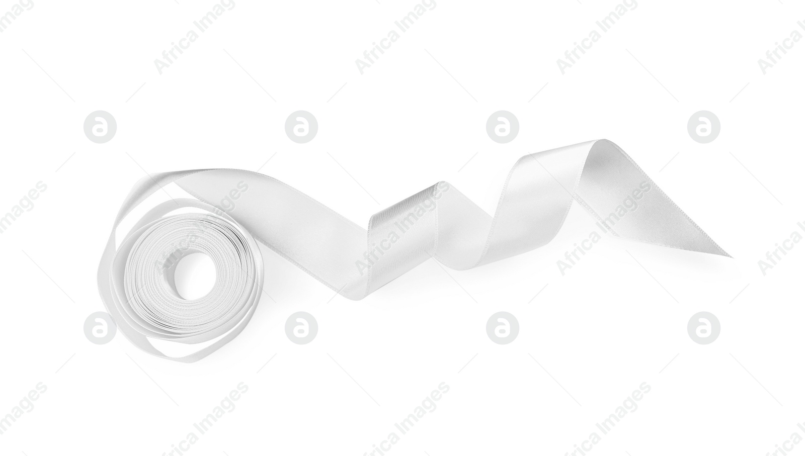 Photo of Satin ribbon on white background, top view