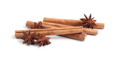 Aromatic cinnamon sticks and anise stars isolated on white