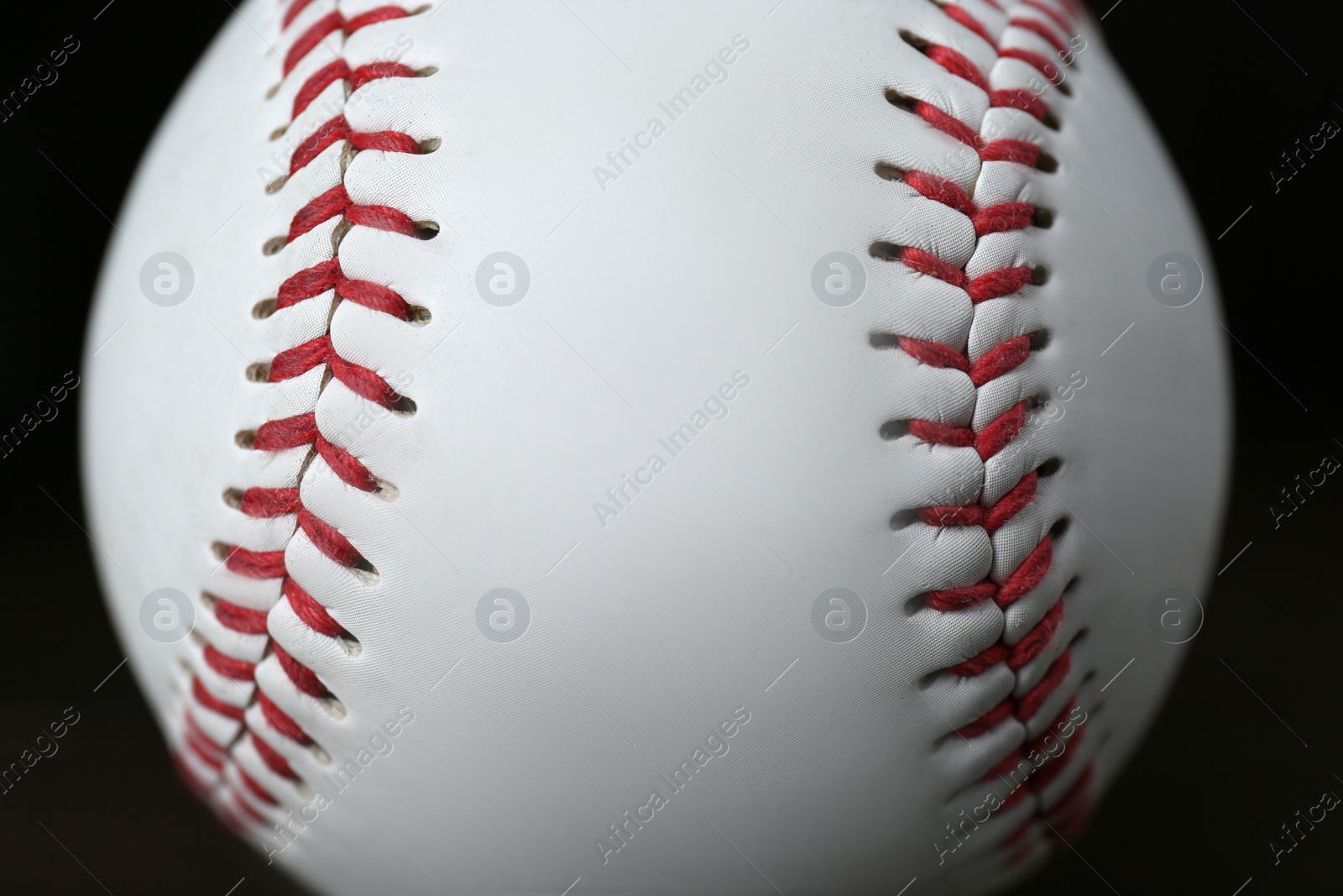 Photo of Closeup view of baseball ball. Sportive equipment