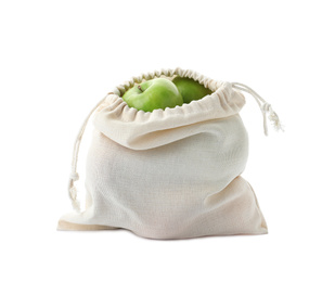 Photo of Cotton eco bag with apples isolated on white