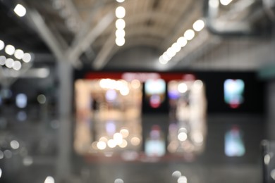 Photo of Blurred view of modern shop in airport