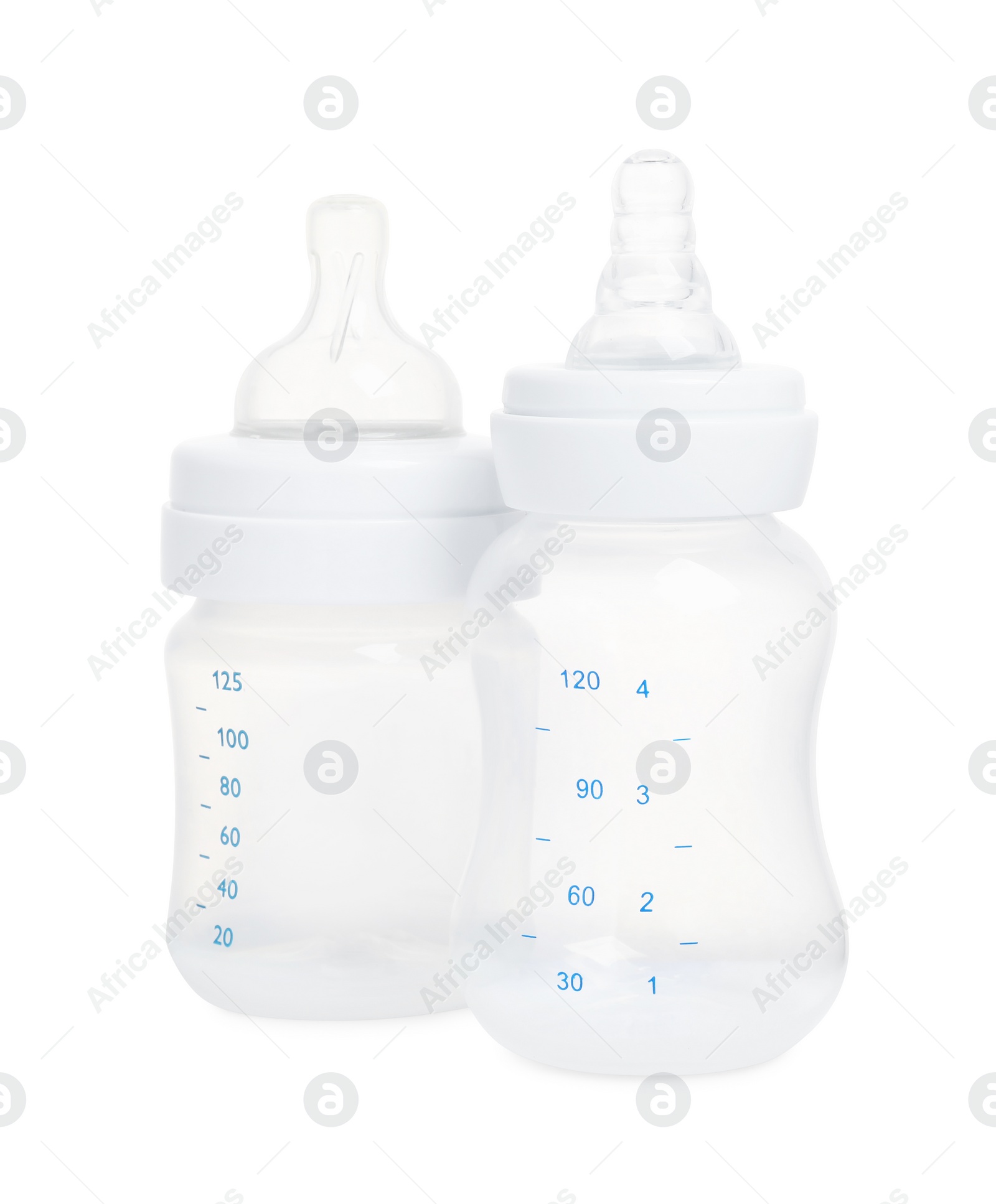 Photo of Two empty feeding bottles for infant formula on white background