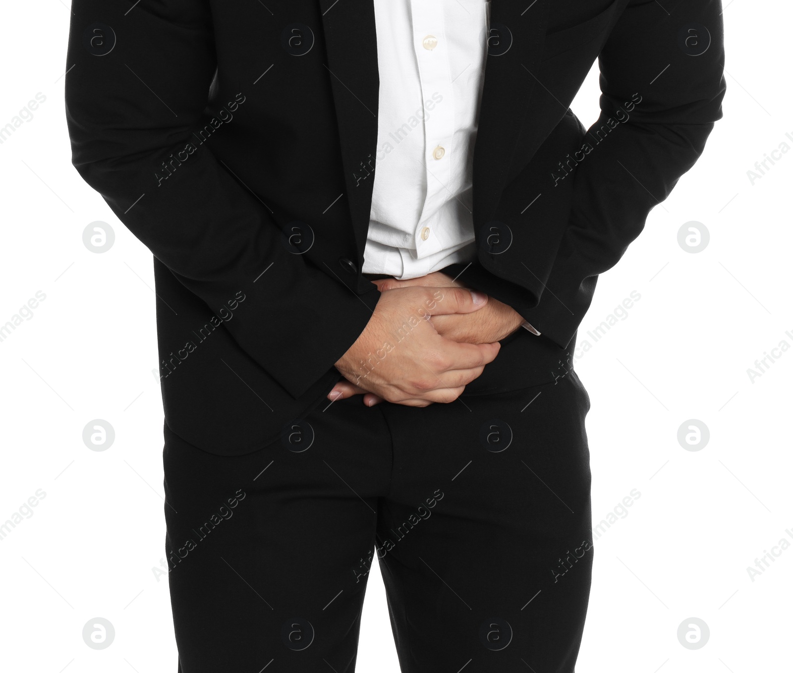 Photo of Businessman suffering from abdominal pain on white background, closeup