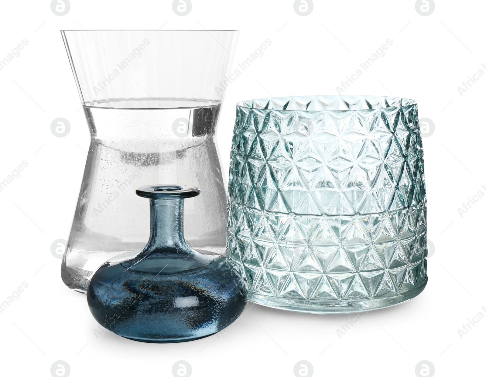 Photo of Different beautiful glass vases on white background