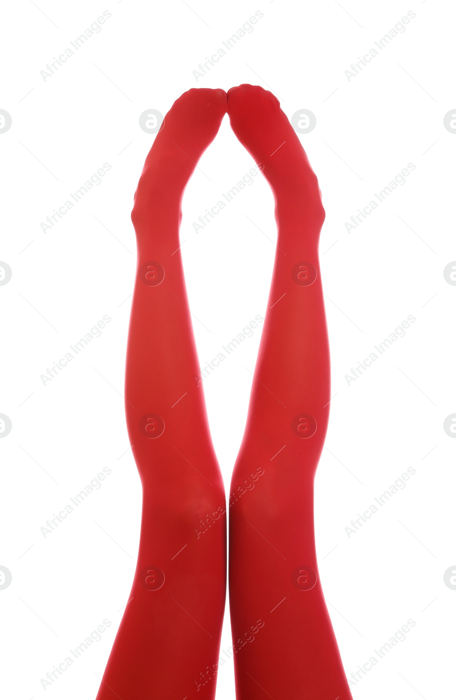 Photo of Woman wearing red tights on white background, closeup of legs