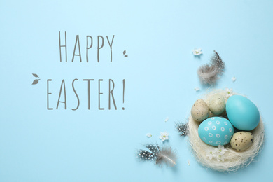 Flat lay composition with eggs and text Happy Easter on light blue background