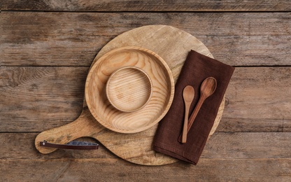 Cooking utensils on wooden table, top view