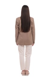 Businesswoman in suit on white background, back view