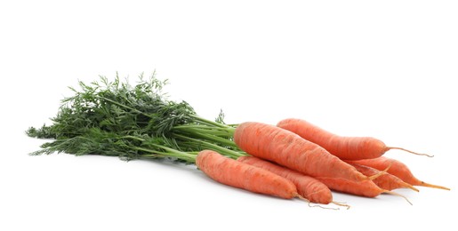 Photo of Many tasty ripe carrots on white background