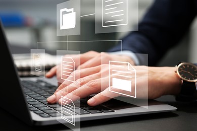 File system. Woman using laptop at table, closeup. Scheme with folder and documents over computer