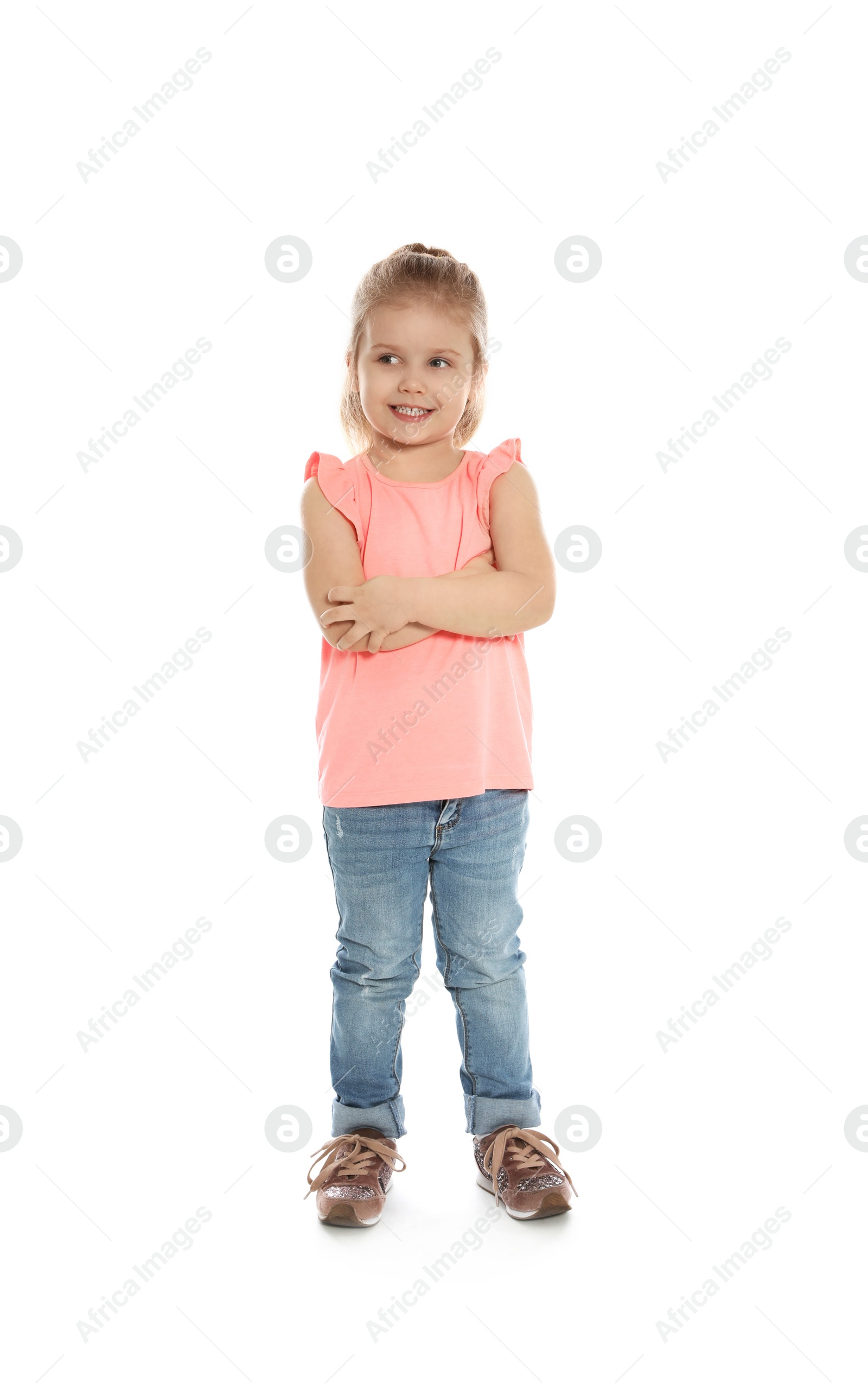 Photo of Full length portrait of cute little girl against white background